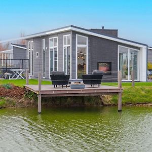 Modern Chalet On The Water At A Holiday Park 벨멜딘게 Exterior photo